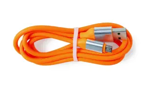 Pomarańczowy kabel USB z wtyczkami USB-A i micro USB. Czy silikon przewodzi prąd? Ten kabel pokazuje, że jego izolacja nie przewodzi.