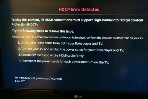 Komunikat błędu HDCP na ekranie telewizora z instrukcjami rozwiązywania problemu.