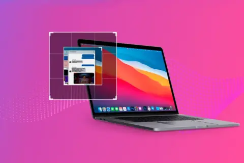 Laptop z otwartym oknem czatu na tle gradientu fioletowo-różowego.