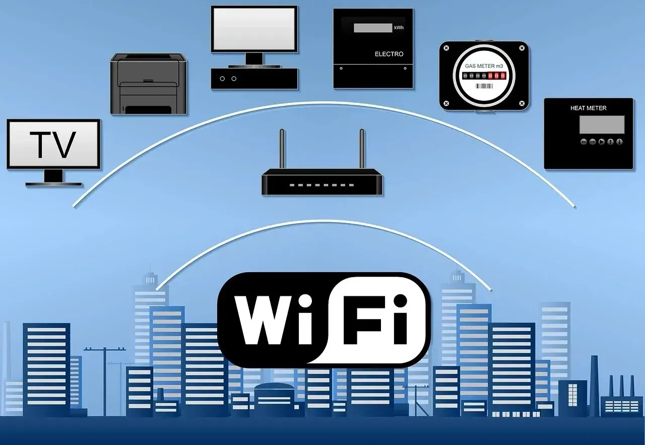 Ilustracja pokazuje, jak podłączyć wzmacniacz wifi, aby zapewnić zasięg dla TV, drukarki i liczników w mieście.